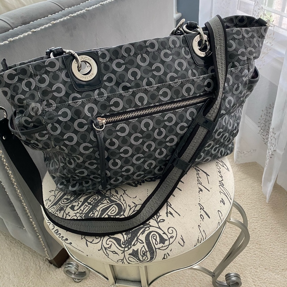 Authentic black and white leather Coach baby bag